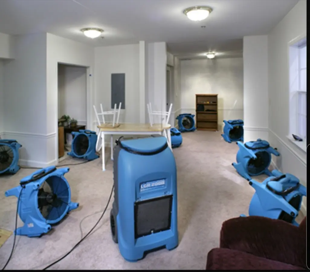 Air movers and dehumidifier setup for Water Damage Restoration in Boston
